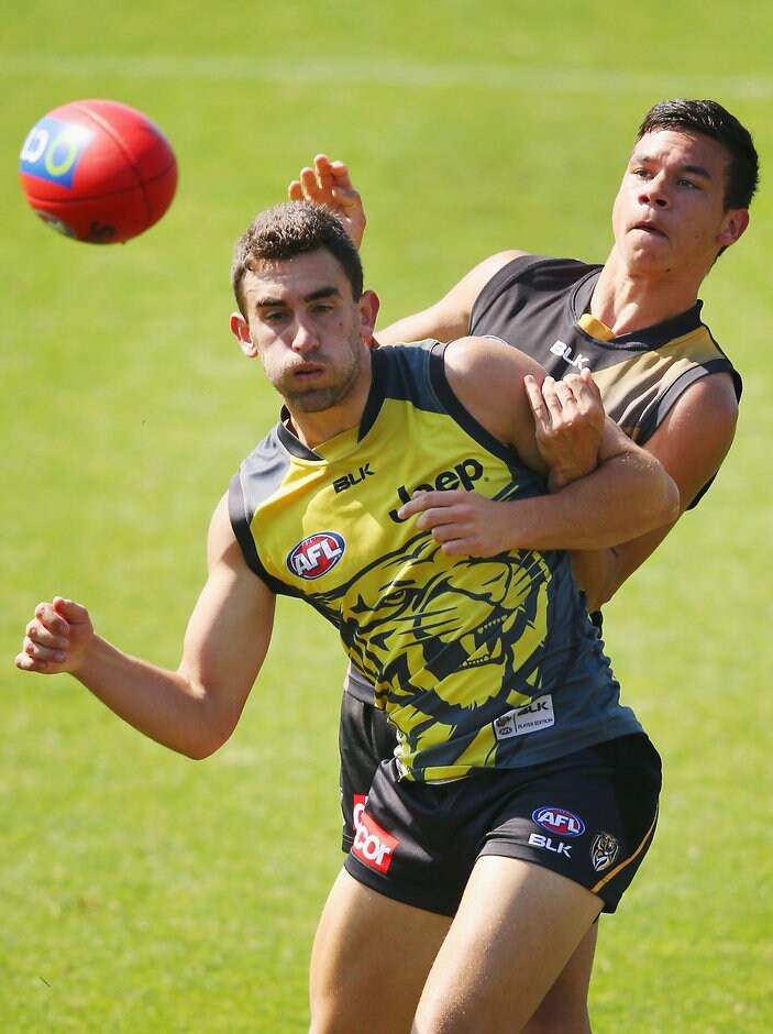 AFL 2016 Training - Richmond Intra-Club Match MELBOURNE, AUSTRALIA - FEBRUARY 12: Daniel Rioli of the Tigers tackles Adam Marcon of the Tigers during the Richmond Tigers AFL intra-club match at Punt Road Oval on February 12, 2016 in Melbourne, Australia. (Photo by Michael Dodge/Getty Images/AFL Media)